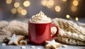 Red mug of hot chocolate with whipped cream and spice cookies. On the back there is a thick winter scarf