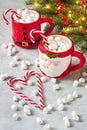 Christmas mugs with hot chocolate and marshmallows