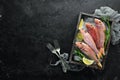 red mullet fish. Sea fish. Seafood on black background. Top view. Royalty Free Stock Photo