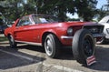 Red 1967 Mustang at car show