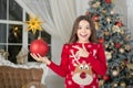 Red is my favorite. Christmas attributes decor. Little girl near christmas tree. Child celebrate christmas at home Royalty Free Stock Photo