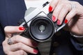 Red Nail Art Design and classic camera.