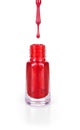 Red nail polish with a drop Royalty Free Stock Photo