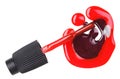 Red nail polish (enamel) drops with brush Royalty Free Stock Photo