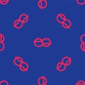 Red Nautical rope knots icon isolated seamless pattern on blue background. Rope tied in a knot. Vector Royalty Free Stock Photo