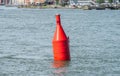 Red navigational bouy showing where to pass Royalty Free Stock Photo