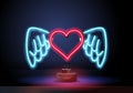red neon heart with wings. Glowing neon heart with wings on brick wall background. Vector illustration can be used for