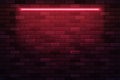 red neon lamp brick wall dark backdrop Royalty Free Stock Photo