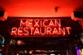 Red neon Mexican Restaurant sign on Lincoln Road Mall in Miami Beach, Florida at night. Royalty Free Stock Photo