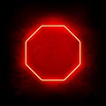 Red Neon Octagon Frame on Grunge Background Royalty Free Stock Photo