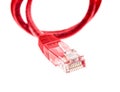 Red network UTP cable with RJ45 connector isolated on white. Royalty Free Stock Photo