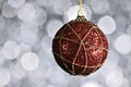 Red New Year and Christmas ball on white,silver background with Royalty Free Stock Photo