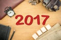 Red 2017 New year number on Wooden Table top with clock,type box Royalty Free Stock Photo