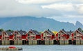 Red norwegian fishing houses rorbu at pier in Svolvaer, Lototen islands, Austvagoya, Vagan Municipality, Nordland County, Norway Royalty Free Stock Photo