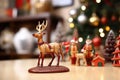red nose reindeer figurine with santas sleigh miniature in the background