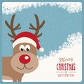 Red nose reindeer santa hat snowy winter background Royalty Free Stock Photo