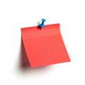 Red note paper with blue pushpin isolated on white background Royalty Free Stock Photo