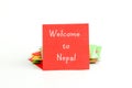 Red note paper with text welcome to nepal