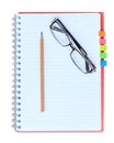 Red notebook pencil and eyeglasses isolated on white background Royalty Free Stock Photo