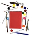 Notepad and bright colored paints on a white background