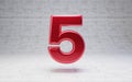 Red number 5. Metallic red color digit isolated on concrete background Royalty Free Stock Photo