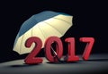Red number 2017 under umbrella. New year mataphor