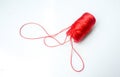 Red nylon thread on background white