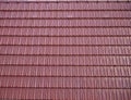 Red oblong roofing tiles.