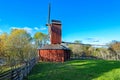 Red ochre colour wooden windmill