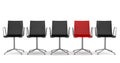 Red office chair among black chairs isolated Royalty Free Stock Photo