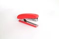 Red office stapler on an isolated white background Royalty Free Stock Photo