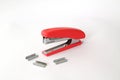 Red office stapler on an isolated white background Royalty Free Stock Photo