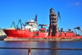 Red offshore and supply ship being repaired in shiprepairing yard Royalty Free Stock Photo