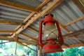 Red oil lamp on roof beam