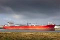 Red oil tanker moored an oil terminal in the Port of Rotterdam Royalty Free Stock Photo