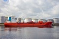 Red oil tanker moored at an silo's at an oil terminal in the Port of Rotterdam Royalty Free Stock Photo