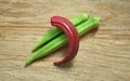 Red okra ,green okra on wood background vegetable for health