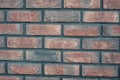 red old brick wall background, brick wall texture, structure. old broken brick, cement joints, close-up. Royalty Free Stock Photo