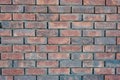red old brick wall background, brick wall texture, structure. old broken brick, cement joints, close-up. Royalty Free Stock Photo