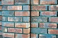 red old brick wall background, brick wall texture, structure. old broken brick, cement joints, close-up. Royalty Free Stock Photo