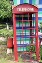 Red old callbox decorate in the garden.