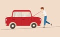 Red old car broke down, young driver is repairing Royalty Free Stock Photo