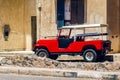 Red old car parked on the street, Dahab Egypt Royalty Free Stock Photo