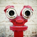 Red old fire hydrant on a street