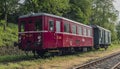 Red old historical diesel train with cargo green car in Ceska Kamenice town