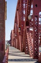 Drawbridge truss red Broadway Bridge across Willamette River in down town Portland