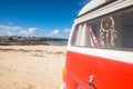 Red old van near a fisherman town in fuerteventura