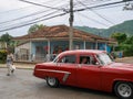 Red old vintage american cars in cuba streets