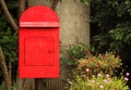 Red old wooden mail box. Royalty Free Stock Photo