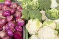 red onion, broccoli and cauliflower in the market